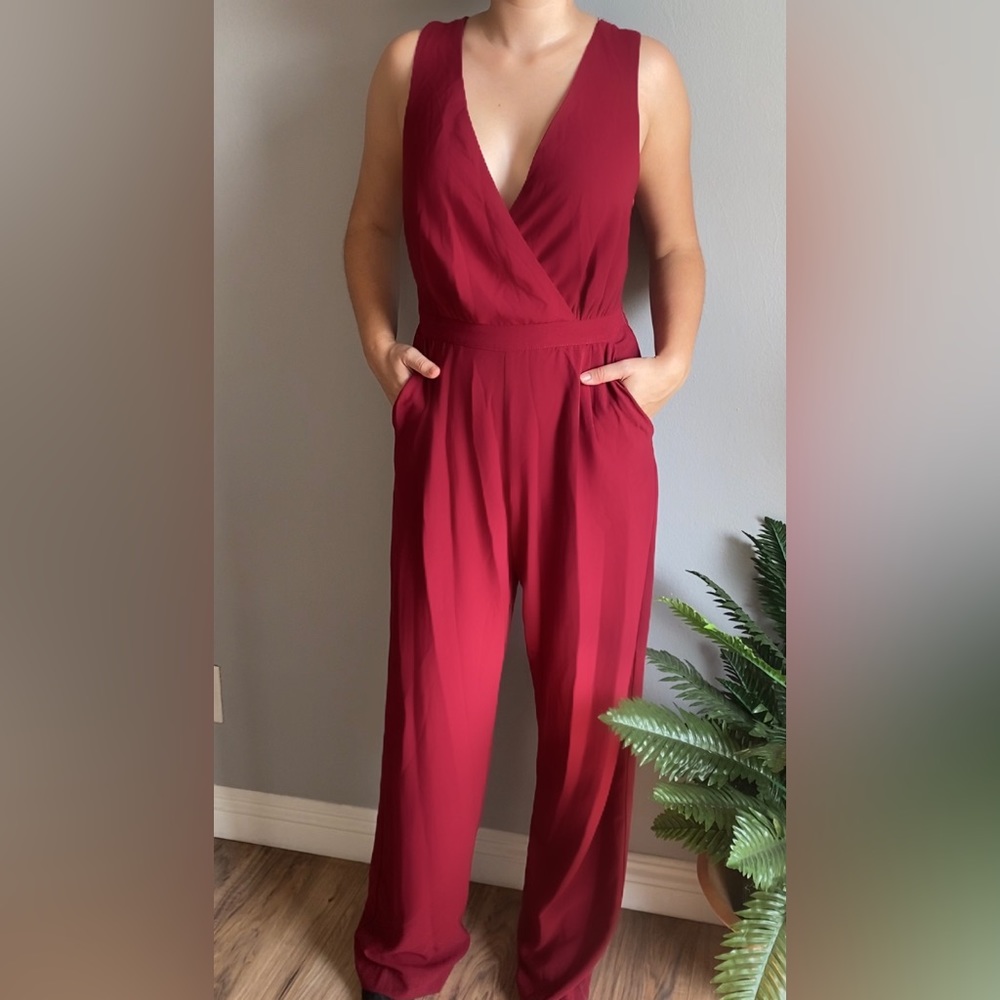 Lulu’s 	
Kiska Burgundy Lace Wide-Leg Jumpsuit size S
